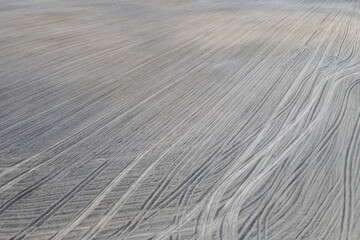 Plowed agricultural field, aerial view. Agricultural land. Background.