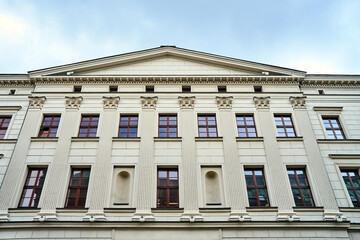 Obraz premium A fragment of a classical facade of the historic building