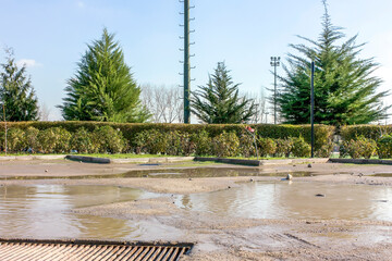 Flooded parking lot on a sunny day in winter