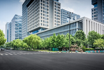 Asphalt road and modern city