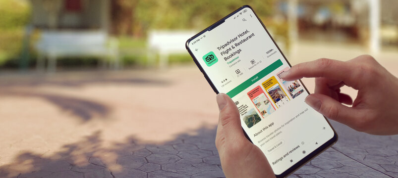 KYIV, UKRAINE-JANUARY, 2020: Tripadvisor on Cellphone Screen. A Cellphone Lying on a Dark Surface with a Tripadvisor Application. Social Application Concept