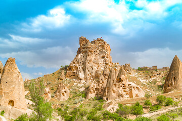 Fototapeta premium A view of Uchisar Castle near the town of Goreme in Cappadocia, Turkey