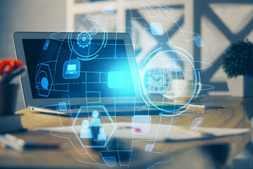 Computer on desktop with social network theme icon. Multi exposure. Concept of international connections.