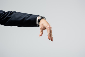 cropped view of businessman manipulating with hand isolated on grey