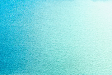 Abstract art background light turquoise and white colors. Watercolor painting on canvas with soft blue gradient.