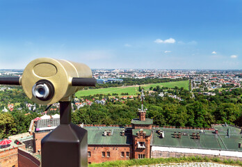 Tourist telescope for landscape exploring in Krakow (Cracow) from Kopiec Kosciuszki. Poland. - obrazy, fototapety, plakaty