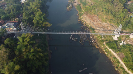 Fototapeta premium aerial view of the bridge connecting the village in the Bantul area of ​​Yogyakarta