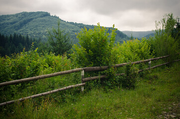 mountain landscape with fence