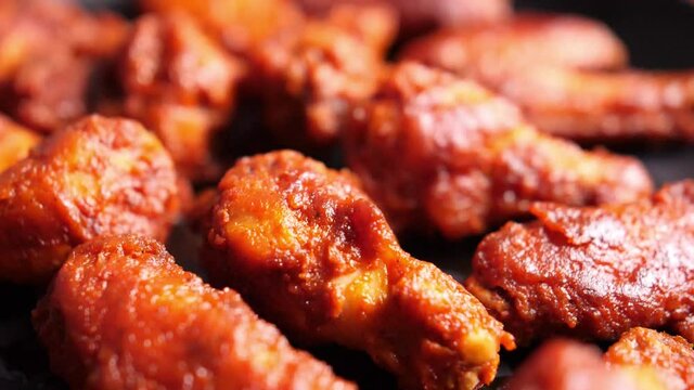 Closeup of spicy hot buffalo wings on a plate