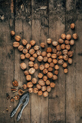 Nuts on an old wooden background. The view from the top. Art.