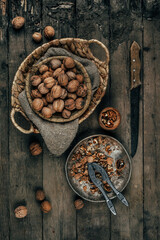 Nuts on an old wooden background. The view from the top. Art.