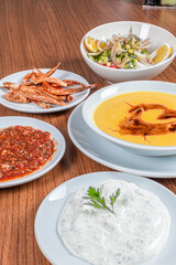 Turkish Traditional lentil Soup with bread on white rustic wooden background, mercimek corbasi.
