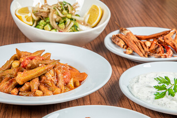 Turkish Traditional Soup with bread on white rustic wooden background, Bamya Yemeği.