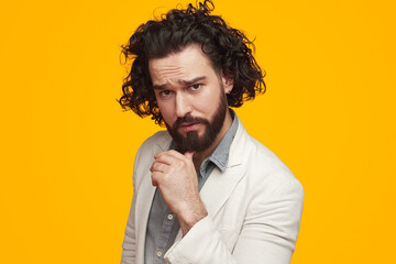 Serious bearded guy looking at camera