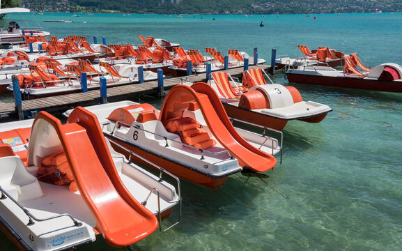 Pedal boats or paddle boats with water slides at Lake Annecy at Haute-Savoie department. France