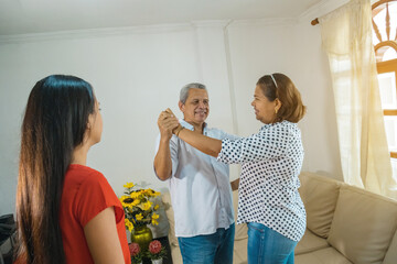 Group of people enjoying together at home