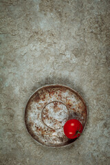 Still life with red tomatoes on a wooden background. The view from the top. Art.