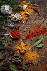 Still life with spices on an iron old rusty background. The view from the top. Art.