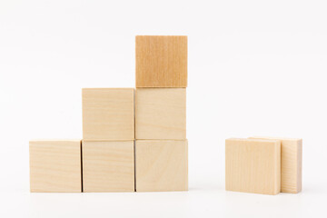 stairs concept; toy wood blocks make a stairs isolated on white background with copy space for your text