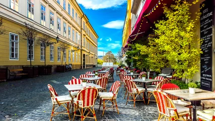 Fototapeten Street cafe without people in the early morning. Budapest. Hungary. © sforzza