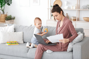 Maternity And Career. Woman Working At Home And Taking Care Of Baby