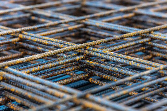 Iron reinforcing bar also known as rebar is stacked ready to be used in construction