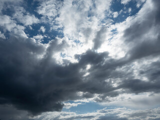 Dramatic clouds in the blue sky