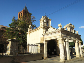 Obraz premium The Saint Eulalia Basilica (Basílica de Santa Eulalia) in Mérida, SPAIN, which the foreground is made with remains of the Roman Temple of Mars