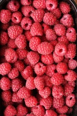 Delicious ripe raspberries on the market macro 