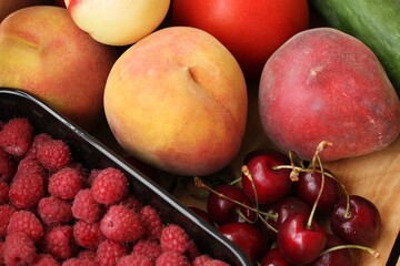 Naklejka na ściany i meble Ripe fruit and berries on the table 