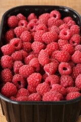 Delicious ripe raspberries on the market macro 