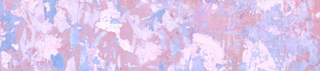Panorama pink and light blue spots on cracked stucco.