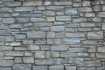 outdoor wall made with stone blocks  with copy space for your text