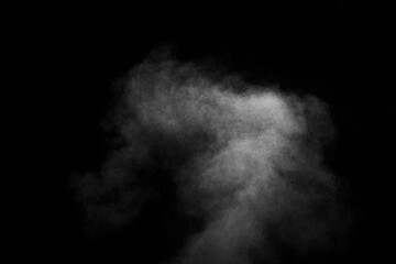 Abstract steam with dots of spray moves on a black background. Figured smoke can be used for design