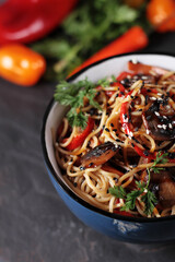 wok udon noodles with mushrooms and vegetables