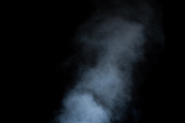 Close-up curls of steam or smoke with drops of moisture isolated on black background, low key, copy space