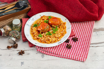 Stuffed tomatoes and rice with tomato