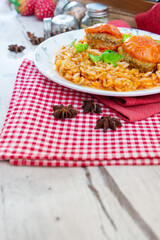 Stuffed tomatoes and rice with tomato