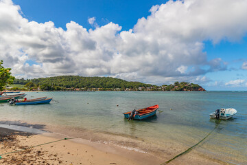 Fototapeta na wymiar Fishing boats in water in Trinite, Martinique, France