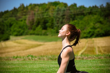 Fototapeta na wymiar Summer Girl Yoga Pose in Nature