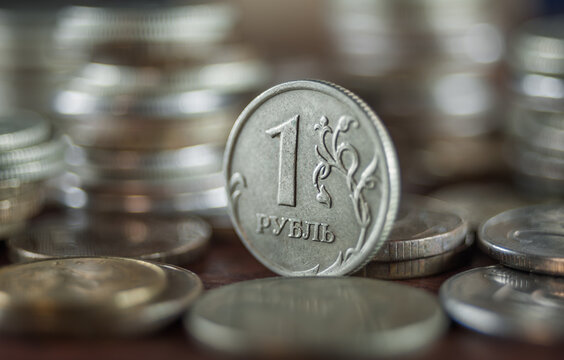 Coin one ruble on a blurred background close-up