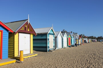 Fototapeta na wymiar colorful beach huts at the beach