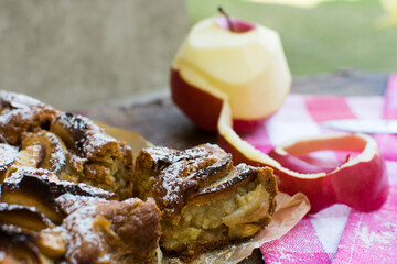 Tasty homemade apple pie on a wooden table.