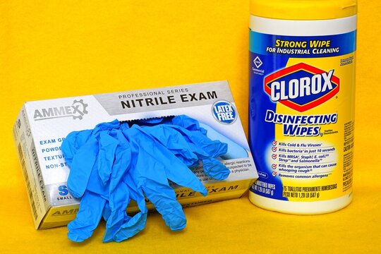 PRINCETON, NJ -30 APR 2020- View Of A Box Of Blue Nitrile Disposable Exam Gloves And Clorox Disinfecting Wipes.