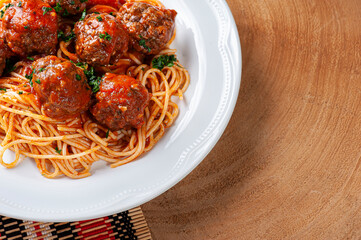 .Meatballs with tomato sauce and pasta. Top view - Almondegas