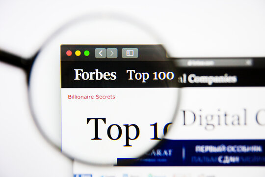 Los Angeles, California, USA - 25 January 2019: Forbes Top 100 website homepage. Forbes logo visible on display screen.