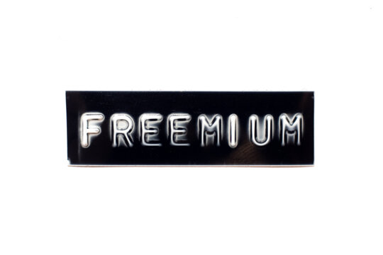 Embossed letter in word freemium in black banner on white background