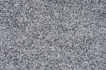 The texture of the wall of pebbles texture small stones Ideal for use in the background design put images and insert text