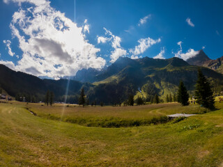 Obraz premium Alpine summer landscape at sunset