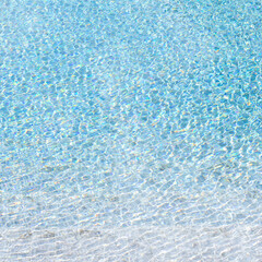 Fototapeta na wymiar Blue swimming pool reflecting